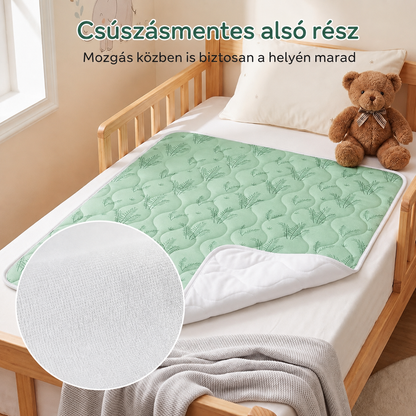 Csúszásmentes aljú matracvédő gyerekágyon, közeli kép a tapadó alsó rétegről