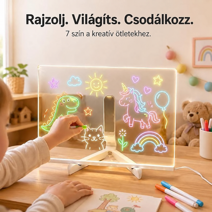 Gyerek dinót, unikornist és cicát rajzol a világító LED rajztáblára hét színes filccel